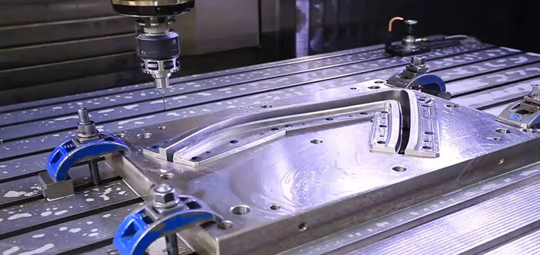 Automotive CNC machining for EV and ICE parts. Aluminum, steel, titanium, PEEK. Tolerances to ±0.005 mm. Prototype to production. Quotes from Kintec.