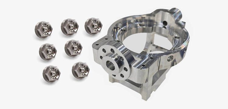 Titanium machining is the production of custom parts cut from titanium bar, plate, or billet on computer-controlled mills and lathes. Done right, it delivers parts with excellent fatigue strength, exceptional corrosion resistance, and the traceability aerospace and medical work demands. Done wrong — wrong tools, wrong speeds, contaminated chips — and you waste premium stock on parts that fail inspection.